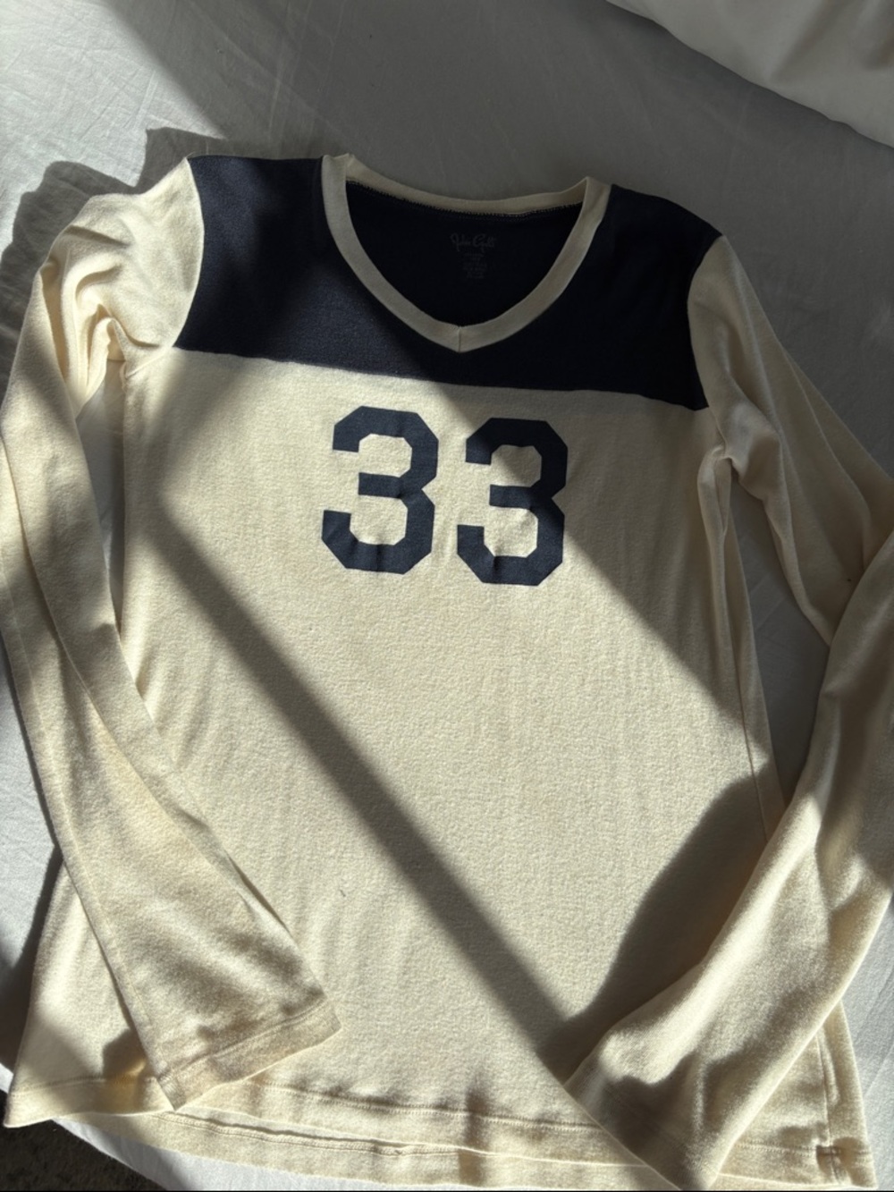 Brandy Melville Cream and Navy V-Neck Sweater with '33'